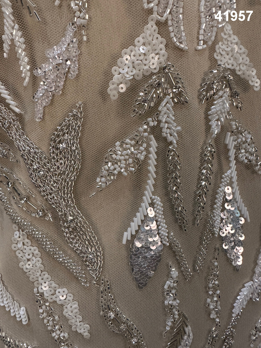 Artisan Crafted Beauty: Hand-Beaded Fabric in Mesmerizing Modern Patterns for Unique Home Décor and Fashion