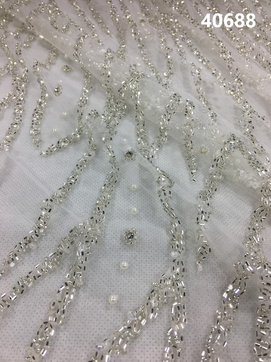 Luxurious Hand-Beaded Fabric with Delicate Beads, Lustrous Pearls, and Dazzling Sequins in a Striking Modern Wavy Design