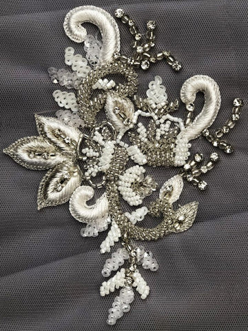 Elegant Embellishments: Artisan-Crafted Motif Applique Adorned with Delicate Beading and Lustrous Sequins