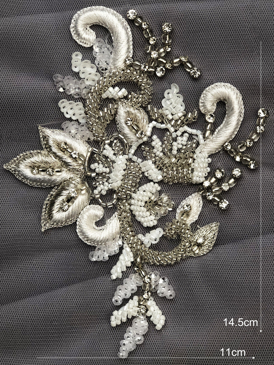 Elegant Embellishments: Artisan-Crafted Motif Applique Adorned with Delicate Beading and Lustrous Sequins