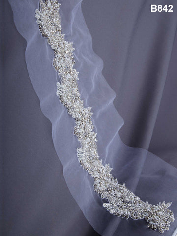 Beaded Blossoms: Hand-Beaded Trim showcasing a Stunning Array of Beads, Sparkling Sequins, and Elegant Floral Motifs