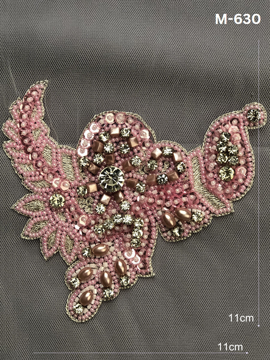 Exquisite Embellishments: Hand Beaded Indian Motifs with Luxurious Beads, Sequins, and Rhinestones